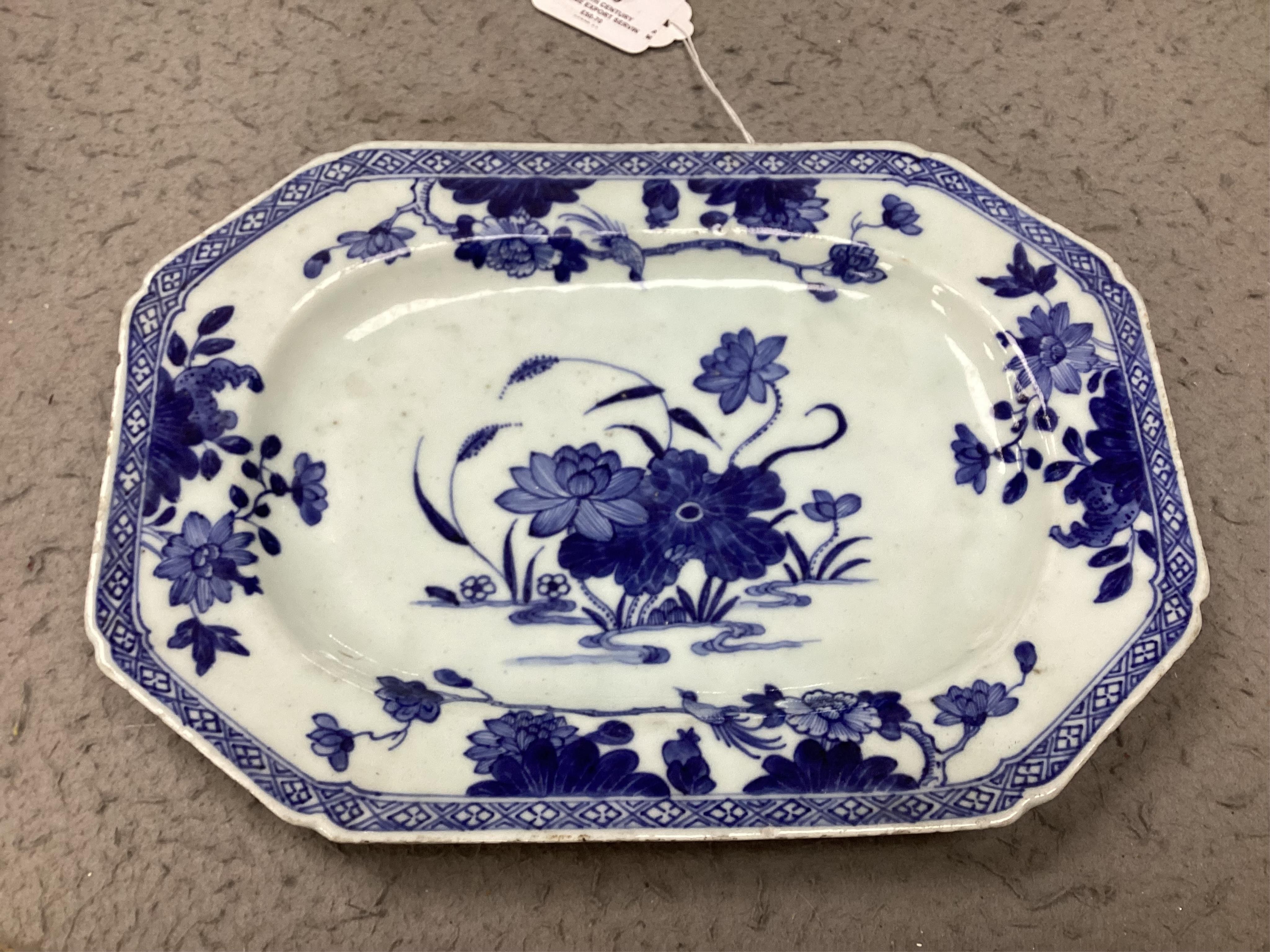 An 18th century Chinese Export serving dish and (repaired) plate, largest 32cm. Condition - poor